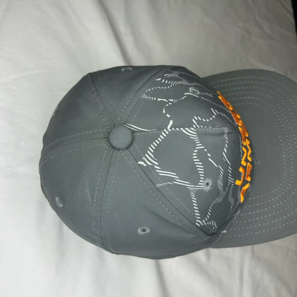 Under Armour Charcoal and Orange Camo Flat Youth Ha SKU B10 - Picture 5 of 9